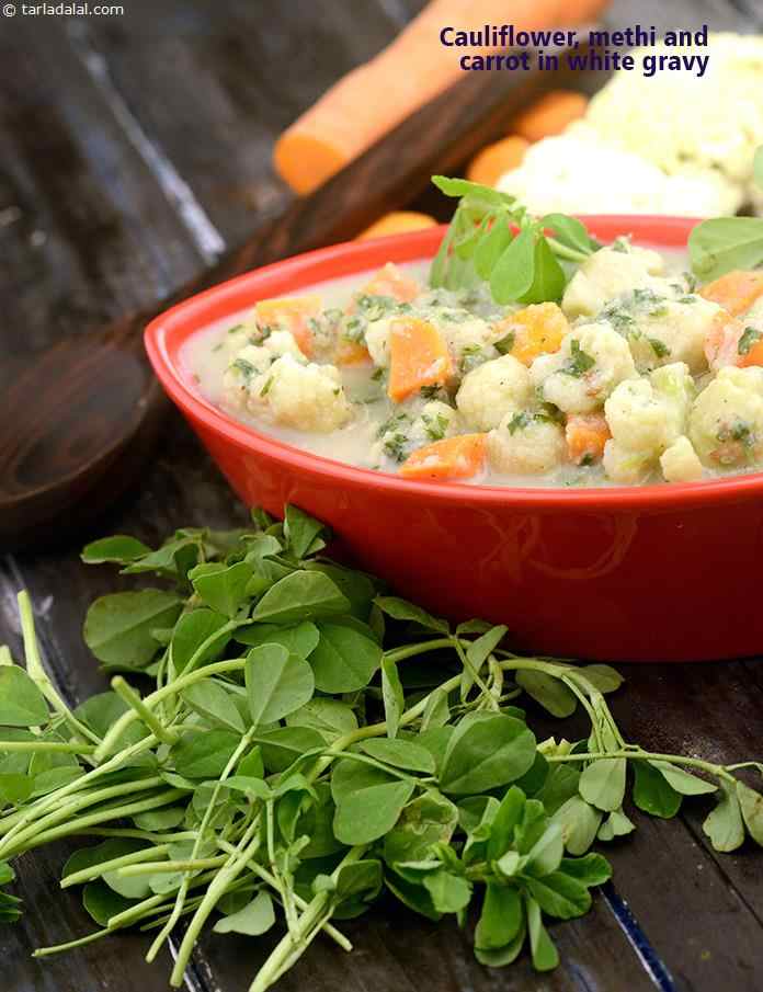 Cauliflower, Methi and Carrot in White Gravy, The pleasing bitterness of fenugreek leaves goes beautifully with the creaminess of cauliflower and the mild sweetness of carrots, combined with white gravy made of onions, milk and myriad spices.
