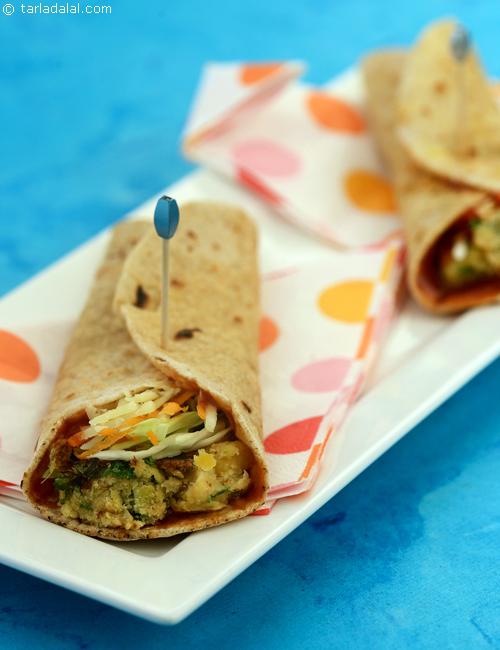 Chapati Rolls, chapatis stuffed with chick pea and soya rolls and lots of raw salad, indeed a healthy wholesome snack to beat your kids hunger pangs.