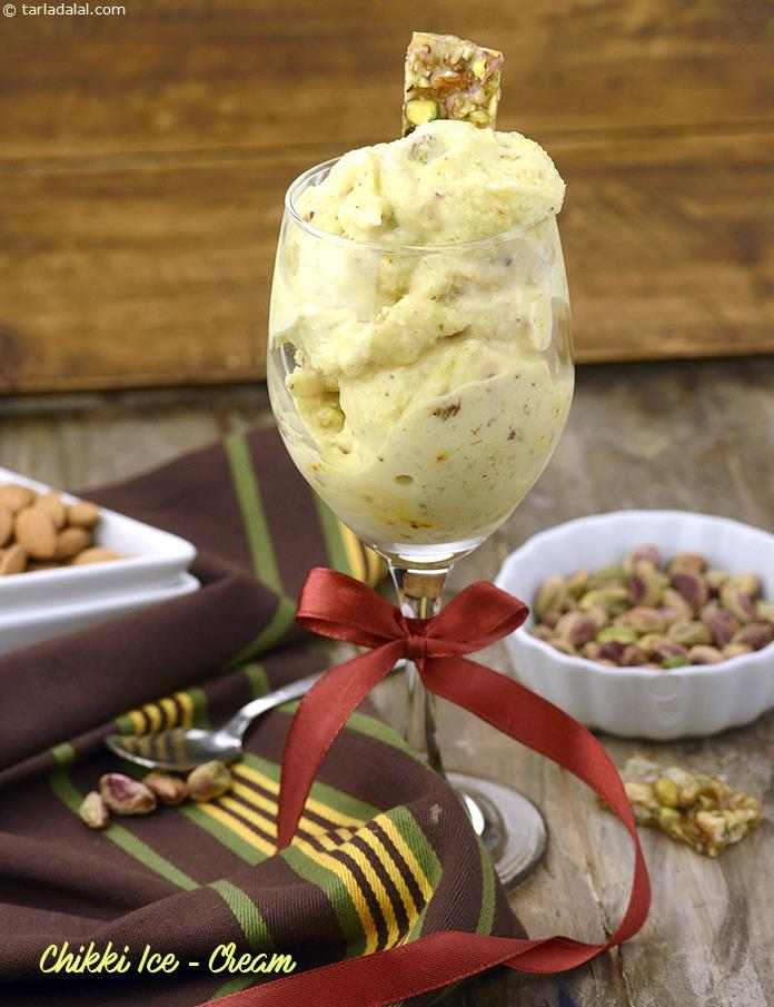 Chikki Ice- Cream, traditional notes of cardamom and saffron flavour this delicious ice-cream, which is enhanced further with crisp and sweet bits of homemade chikki. 