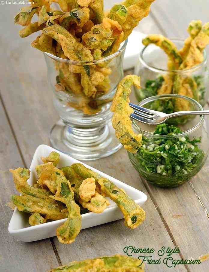 Chinese Style Fried capsicum,is a unique way of serving capsicum and will be enjoyed by your loved ones.Try serving it with green garlic sauce or a schezuan sauce. Crunchy, munchy and yummy!