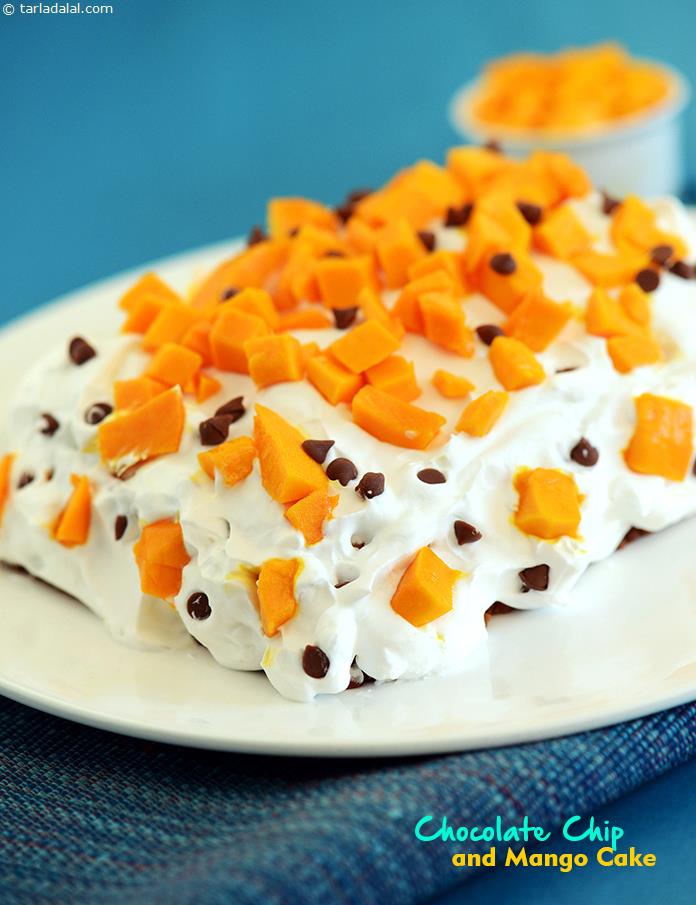 The Chocolate Chip and Mango Cake is a fun-filled dessert that can be readied in a jiffy using chopped mangoes, biscuits, orange juice and whipped cream. 