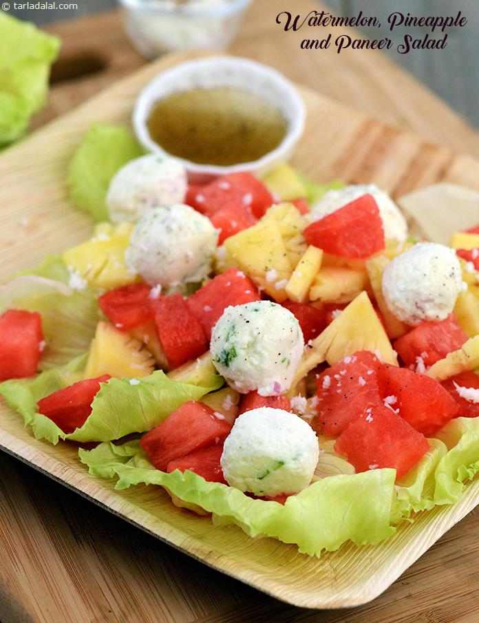 Watermelon , Pineapple and Paneer Salad, flavourful paneer balls containing crunchy veggies and coconut are combined with juicy fruits, all of which is arranged on crisp lettuce leaves, topped with a lemony honey dressing. 