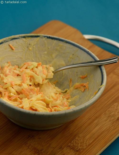 Cole Slaw, creamy cabbage and carrot salad served chilled.