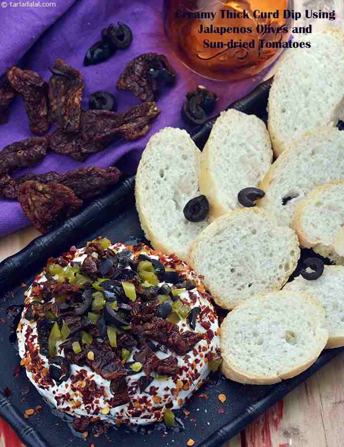 Creamy Thick Curd Dip Using Jalapenos, Olives and Sun-dried Tomatoes