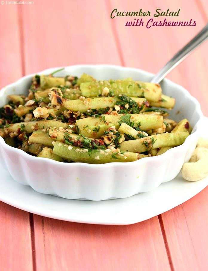 Cucumber Salad with Cashewnuts, crunchy cucumber and snappy cashewnuts make a wonderful combination and it is mixed in with coriander, lemon juice, soya sauce, sugar and chilli for a hot-sweet flavour.