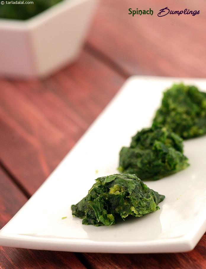 Mix-shape-microwave, and there you have delicious Spinach Dumplings on the plate, ready to be relished with green chutney. A perfect mix of spinach, flours, curd, spices and baking soda.It is easy to make and delicious to bite into.