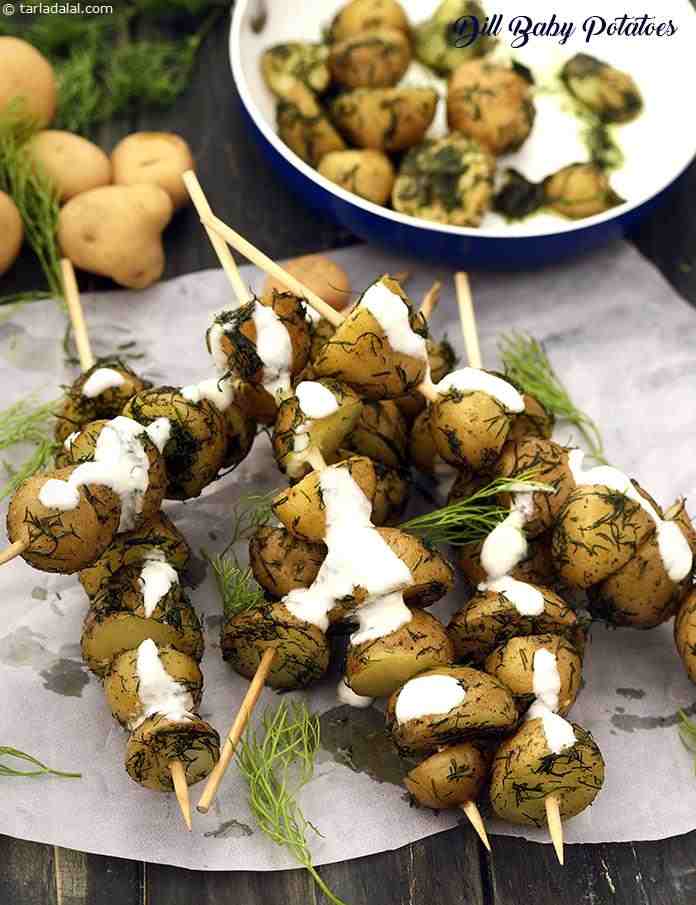 A mouth-watering delicacy of baby potatoes tossed with butter and dill! A tangy curd dressing further improves the texture and flavour of the Dill Baby Potatoes