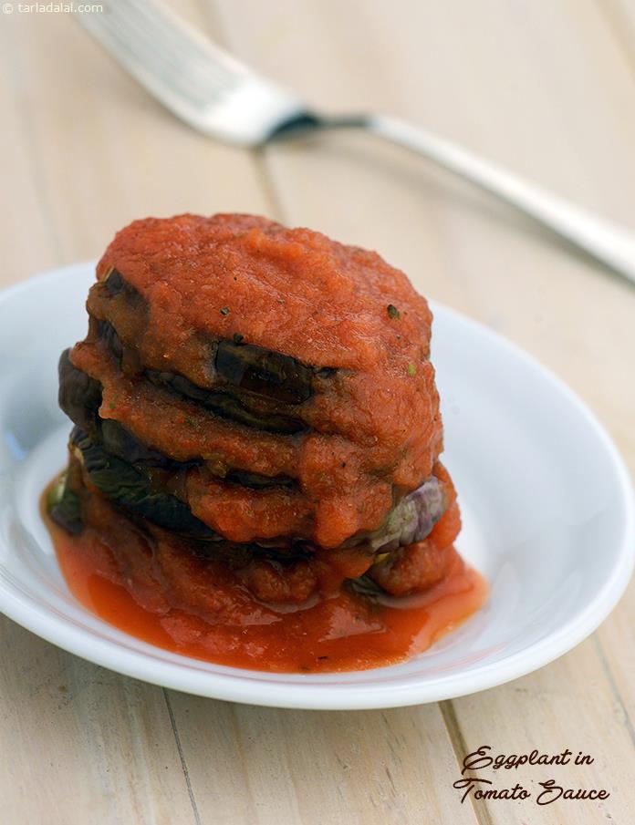 Eggplant in Tomato Sauce, you will love the perfect texture of the eggplant slices and the balanced flavour of the tomato sauce, all of which make this quick and easy recipe a delight to behold and dig into! 