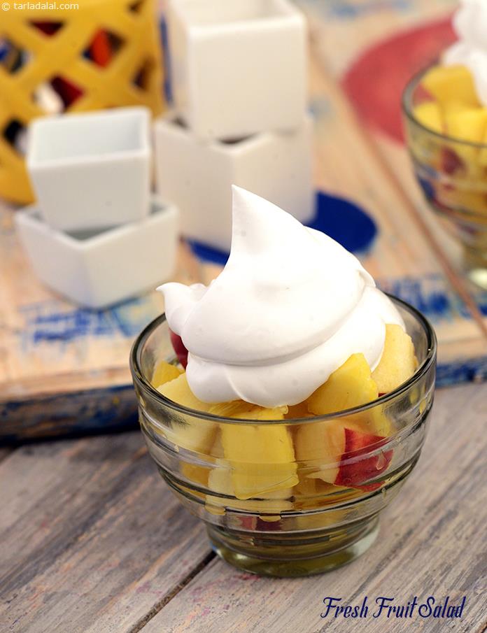 Fresh Fruit Salad is tasty and yummy, throw in all the fruits you like with a dash of sweetened cream. You could use vanilla ice-cream instead of whipped cream.
