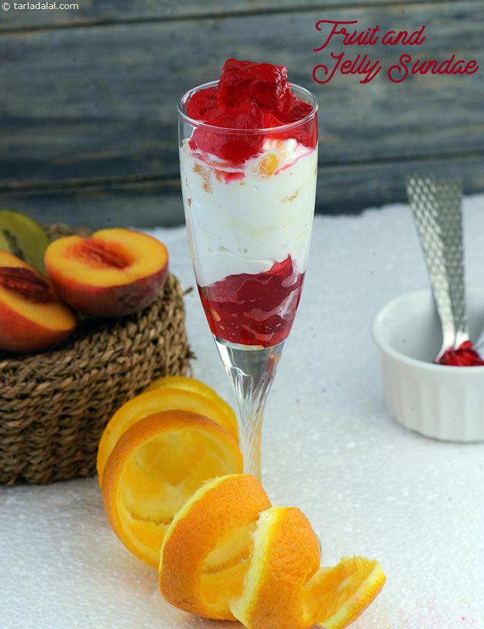 Fruit and Jelly Sundae, here is a dessert you can conjure up in minutes, provided you have some jelly, whipped cream and fruits at home. All you need to do is chop, mix, top, chill, serve!