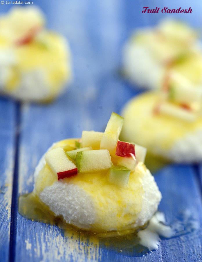 The Fruit Sandesh, a rich sandesh topped with homemade orange sauce and an assortment of fruits, this dessert is a medley of all your favourite things. 