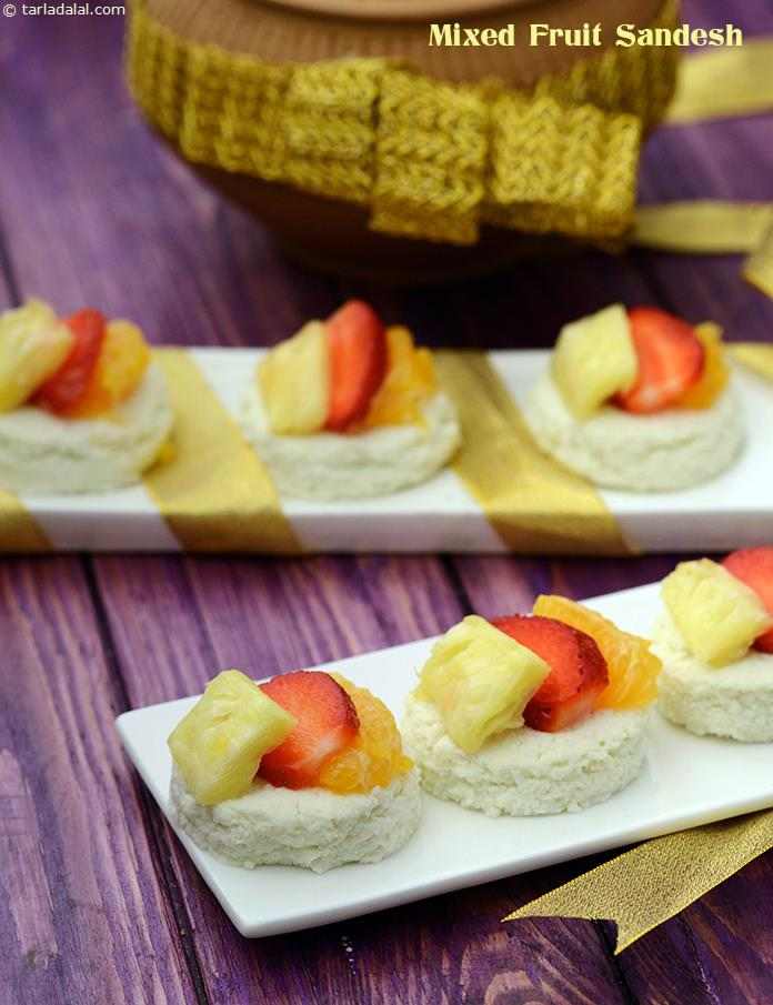 Using paneer and icing sugar enables you to prepare this popular Bengali favourite within minutes, while kewda essence gives it a traditional flavour and aroma. Topping with fresh fruits makes the Mixed Fruit Sandesh a refreshing dessert.