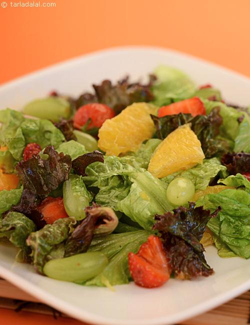 Fruity Lettuce Citrus Salad, sweet and sour fruits with a tangy lemon juice and orange squash dressing.