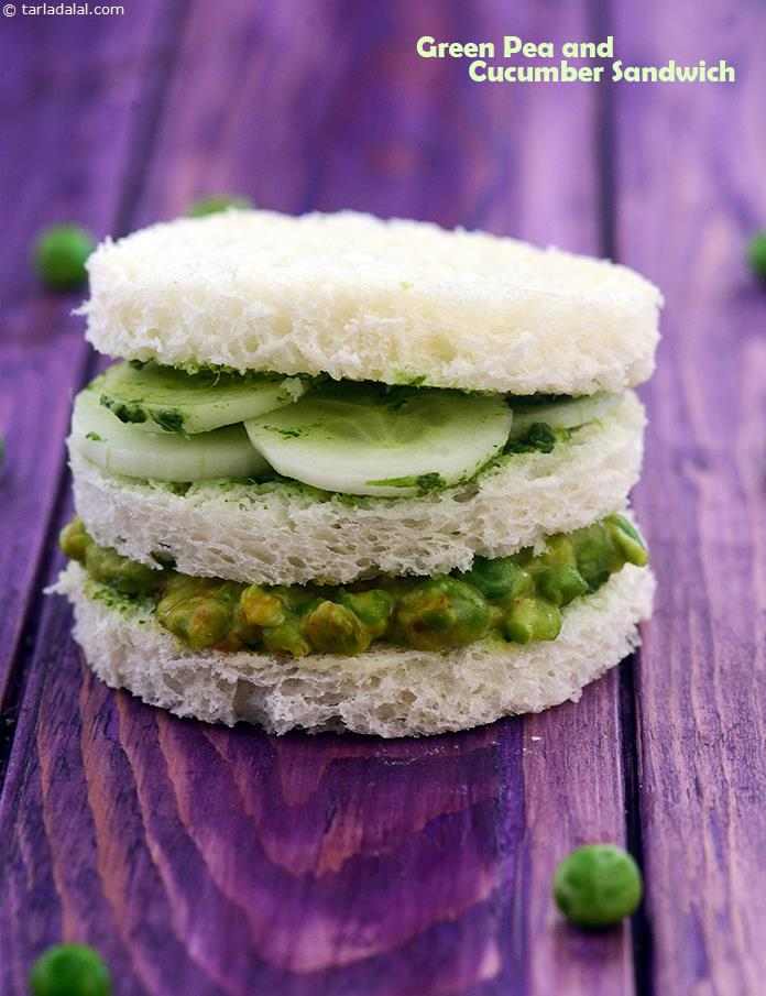 Green Pea and Cucumber Sandwich,  triple-decker feast prepared with buttered bread roundels packed with a green peas mixture and refreshing cucumber slices.