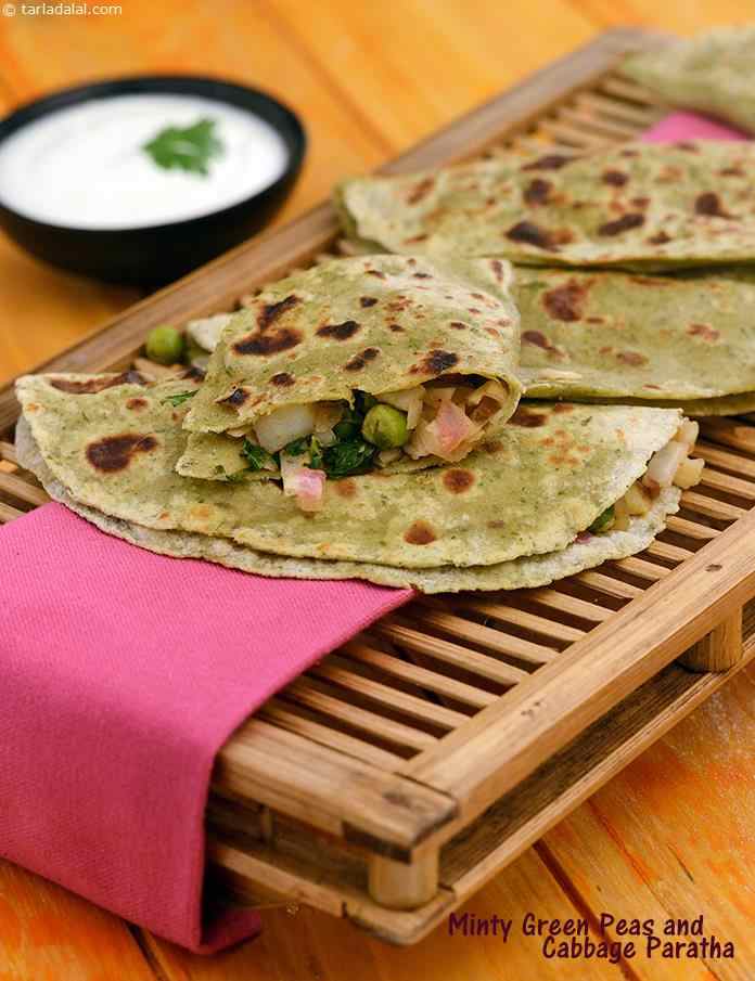 Green Peas, Cabbage and Potato Paratha,  a unique variation of the common phudina paratha. Stuffed with loads of veggies to create a truly gourmet indian dish. 