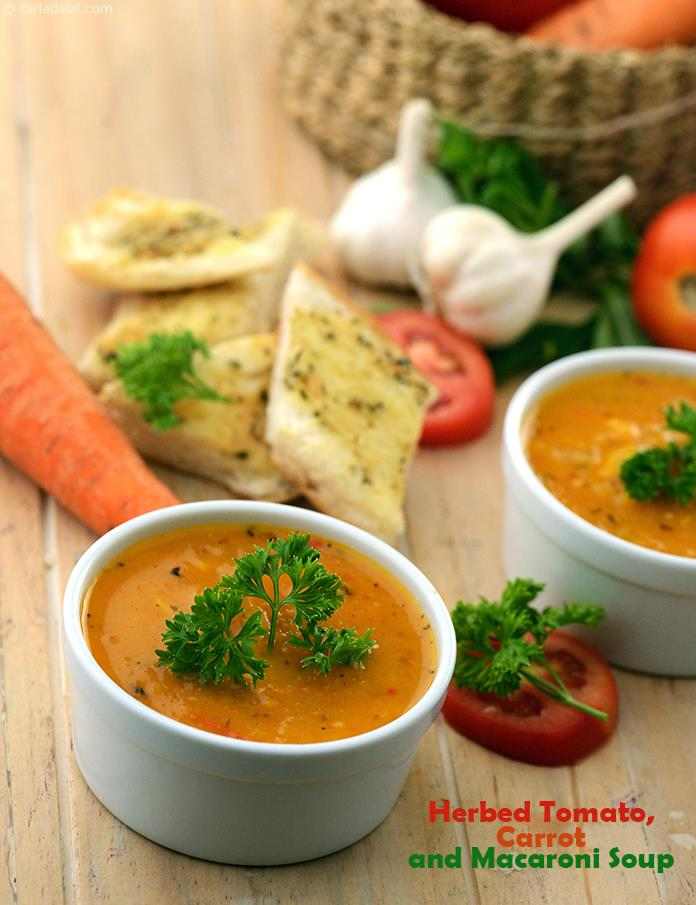 An interesting combination of tangy tomatoes and crunchy carrots, perked up with oregano, this Herbed Tomato, Carrot and Macaroni Soup is sure to enthrall you with its unique texture and rich flavour.