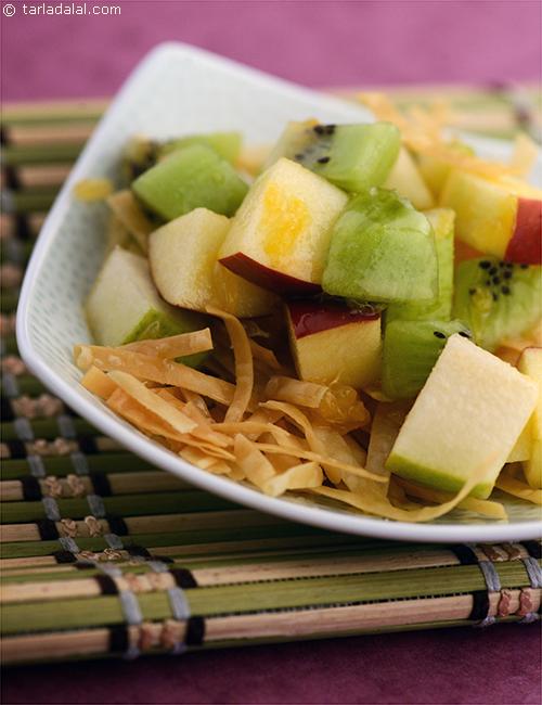 Honeyed Noodles with Fruits, crispy fried noodles drizzled with honey is a hot and cold combination when served with chilled fruit salad.
