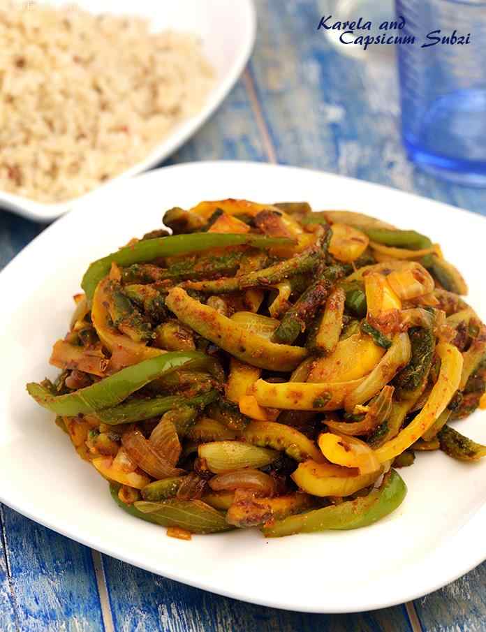 Karela and Capsicum Subzi,  an innovative combination of bitter gourd, onions and colourful capsicums are sautéed with a traditional tempering, resulting in a flavourful and aromatic subzi that goes well with rice and rotis.