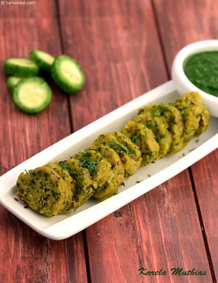 Karela Muthias, karela and flour dumplings that are enlivened with the addition of onions and garlic to make a delicious breakfast. Karelas and garlic the  diabetic friendly ingredients  help to maintain the blood sugar levels. 