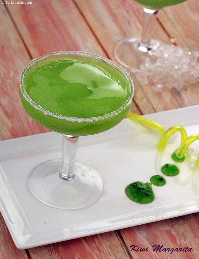 An energetic combination of kiwi with lemon makes this citrus drink perfect for the summer. The bright green colour of kiwi crush, speckled with tiny black seeds adds a dramatic tropical flair to the Kiwi Margarita.