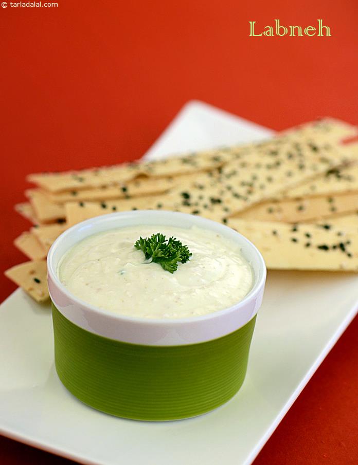 Labneh is a Lebanese dip of hung curds, seasoned with garlic and nutty flavoured sesame seeds.