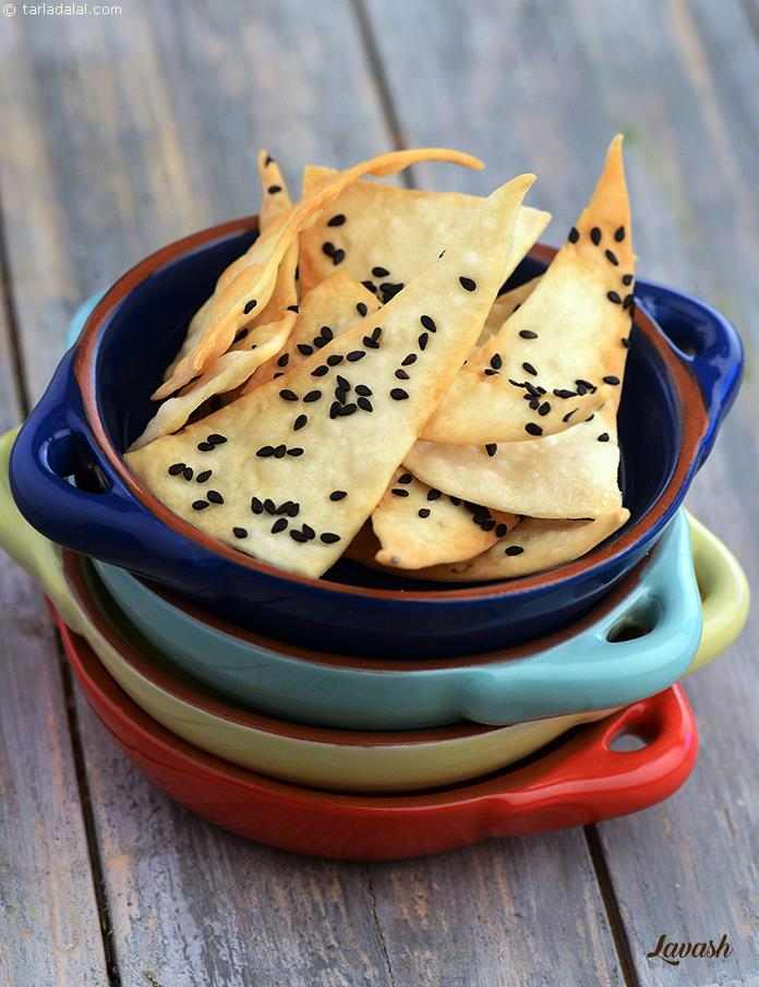 With mild scents of olive oil and the strong aroma of toasted sesame, Lavash is a bread par excellence. Bake them fresh, allow them to cool and turn crispy, then serve with a cheesy or tangy accompaniment.