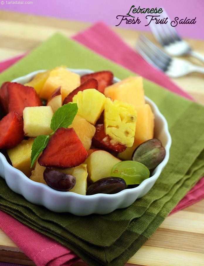 Lebanese Fresh Fruit Salad, cubes of fresh garden fruits tossed with honey and garnished with fresh mint leaves. For best results serve chilled.