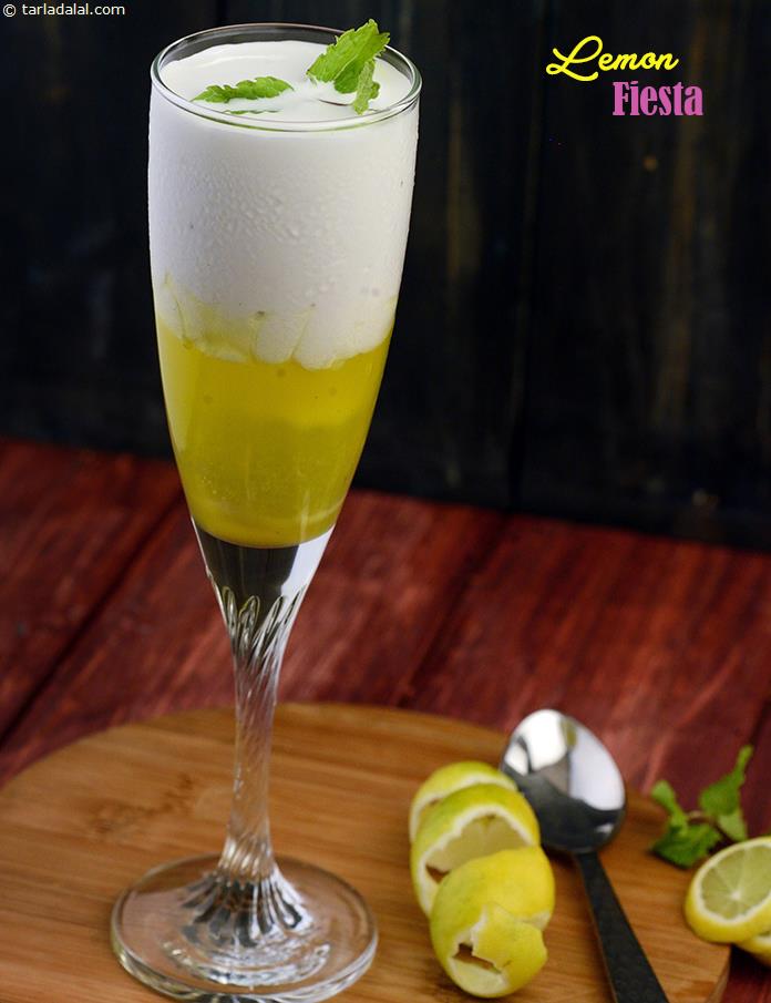 Lemon Fiesta, ice-cream softened with whipped cream and pepped up with lemon rind and lemon essence is served atop a tongue-tingling lemon sauce, with a simple yet suitable garnish of mint leaves. 