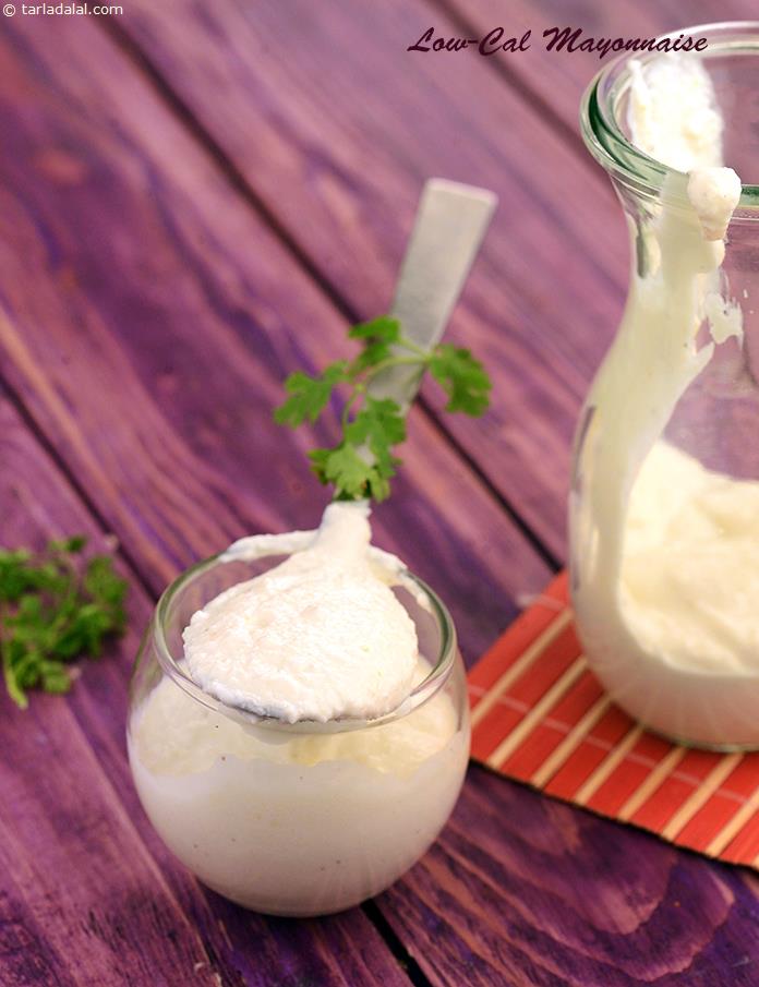 Low- Cal Mayonnaise, this recipe reduces the calories almost to half as compared to our regular mayonnaise. Unusual ingredients like bread and low-fat curds are used to help retain the texture as well the taste. 