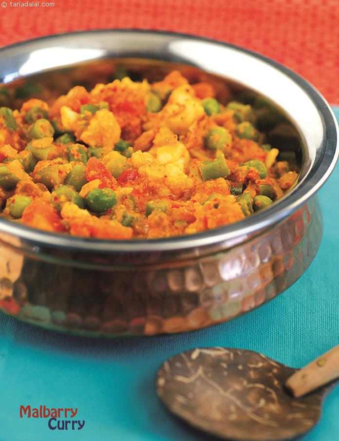 Malabari Curry, the veggies rest in a base of coconut milk, and coconut is used in the masala paste also. So, overall the soothing flavour of coconut and the soft feel of boiled vegetables dominate this recipe.
