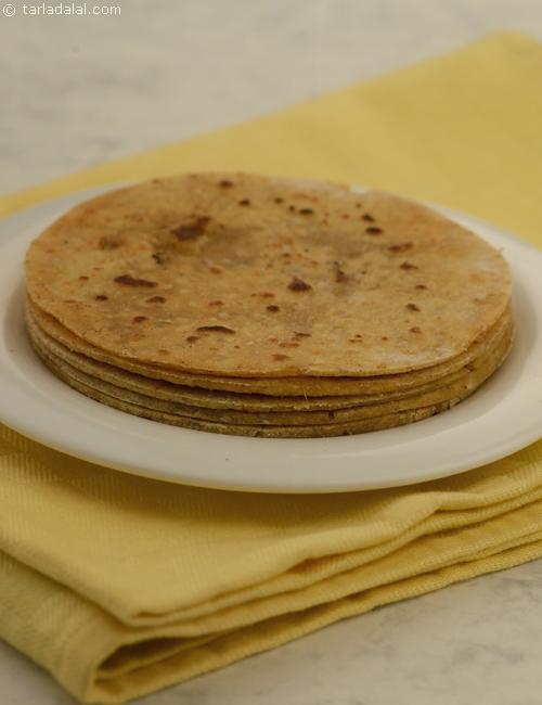 Meethi Mugdi, spicy sweet crisp rotis made from a dough of leftover khichadi, wheat flour , jaggery and chillies.