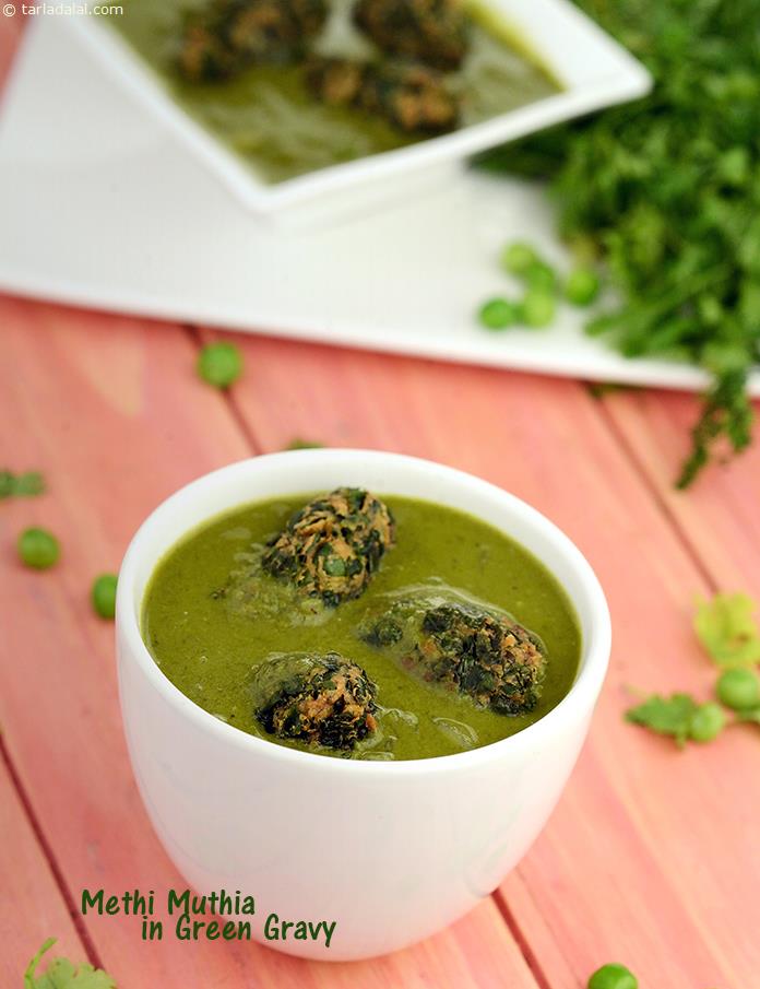 Methi muthia is a popular Gujarati tea-time snack, which may be steamed on fried. Here, fried muthias are added to mouth-watering coconut milk based gravy, along with fresh green peas, resulting in an irresistible accompaniment for rotis.