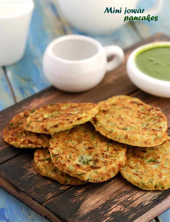 Mini Jowar Pancakes, add cucumber, onions, curds and green chillies to otherwise bland jowar flour to create soft and tasty pancakes