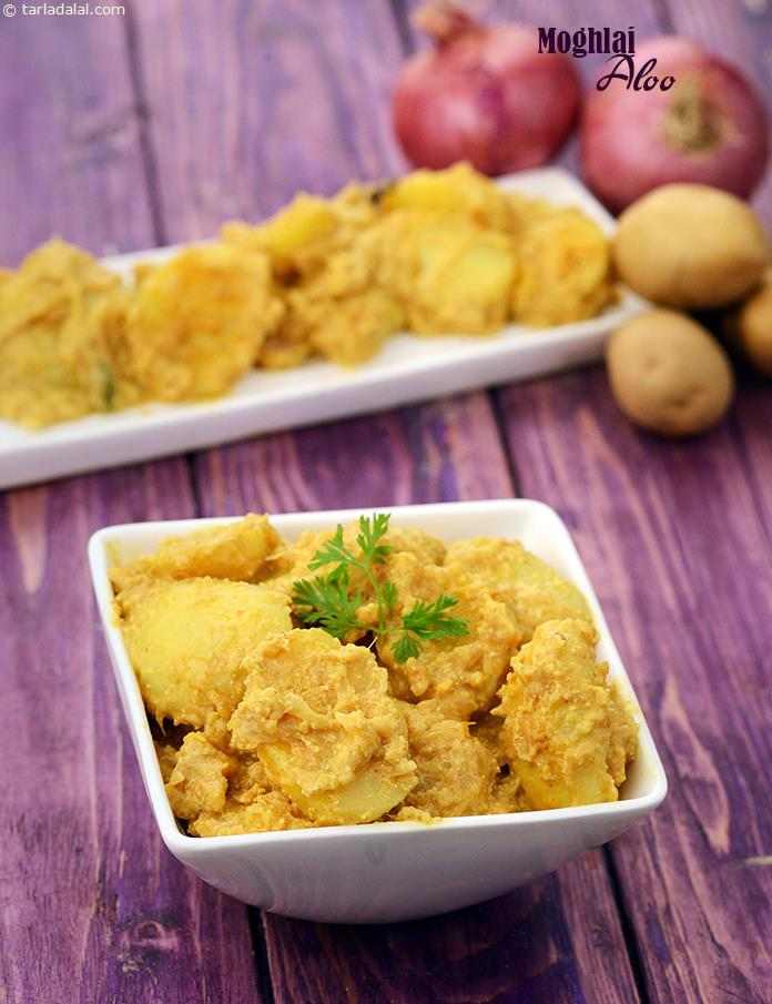 Moghlai Aloo is a popular preparation of deep-fried or marinated baby potatoes in a spicy, creamy base. Moghlai cooking is known for its richness and elaborate masalas, and that is true of this recipe also. 