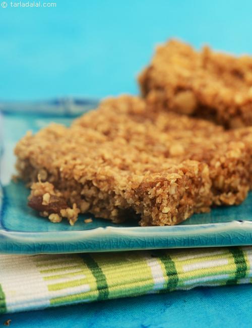 Nutty Flapjacks, a sweet treat for kids made from oats has a nutty flavor and crunch and is rich in iron and fibre.