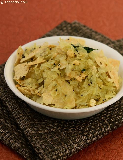 Papad Poha, a quick chivda of poha and papad made in a microwave  with mustard seeds, daria and curry leaves tempering.