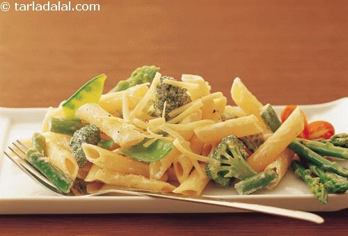 Penne with Creamy Vegetables tastes delicious with penne tossed in garlic flavoured white sauce and fresh veggies like asparagus, broccoli and snow peas.