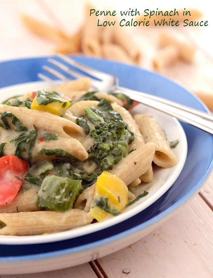 Whole wheat penne is tossed in a unique low-calorie white sauce made with low-fat butter, whole wheat flour and low-fat milk. Cauliflower imparts an interestingly coarse mouth-feel to the sauce, while spinach adds to its health quotient.