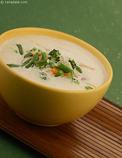 Potage Darblay, thick milky potato soup garnished with microwaved mixed vegetables,