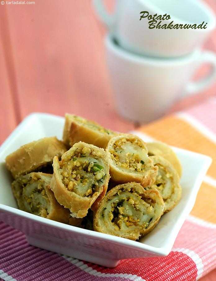 Potato Bhakarwadi is a modified version of the traditional savoury, with a layer of mashed potato between the flour dough and spicy coconut mixture. 