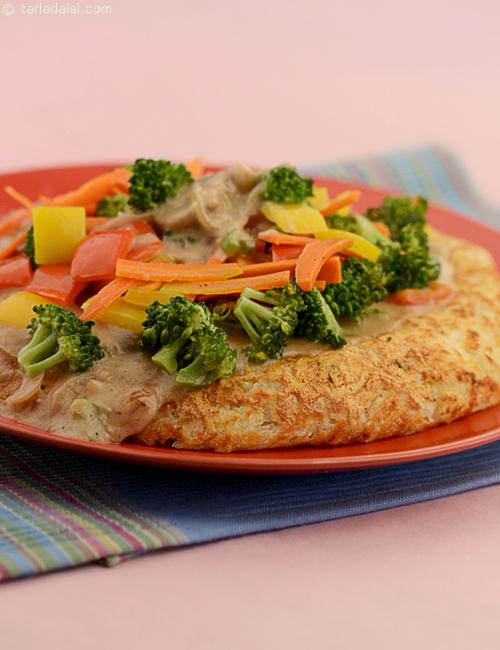 Potato Rosti with Mushroom Pepper Sauce served with buttered vegetables.