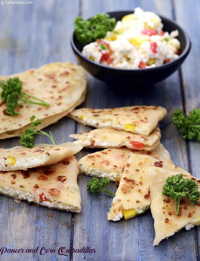 Mexican cooks have lots of ways of stuffing a tortilla. This quick and easy one has paneer, corn and cheese.