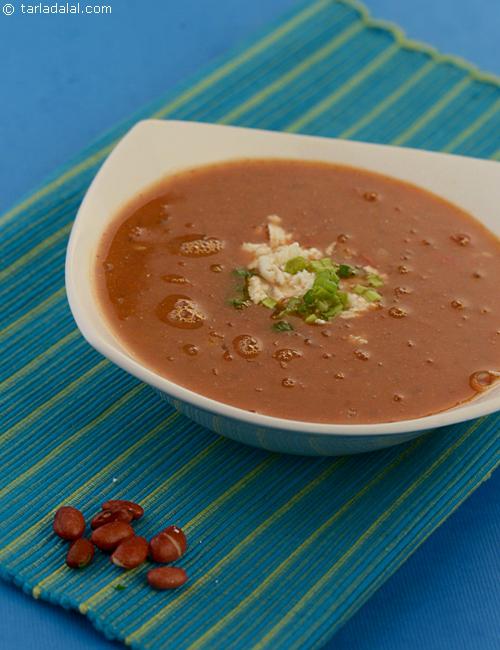 Rajma and Tomato Soup, hot, spicy and wholesome soup garnished with paneer and spring onions.