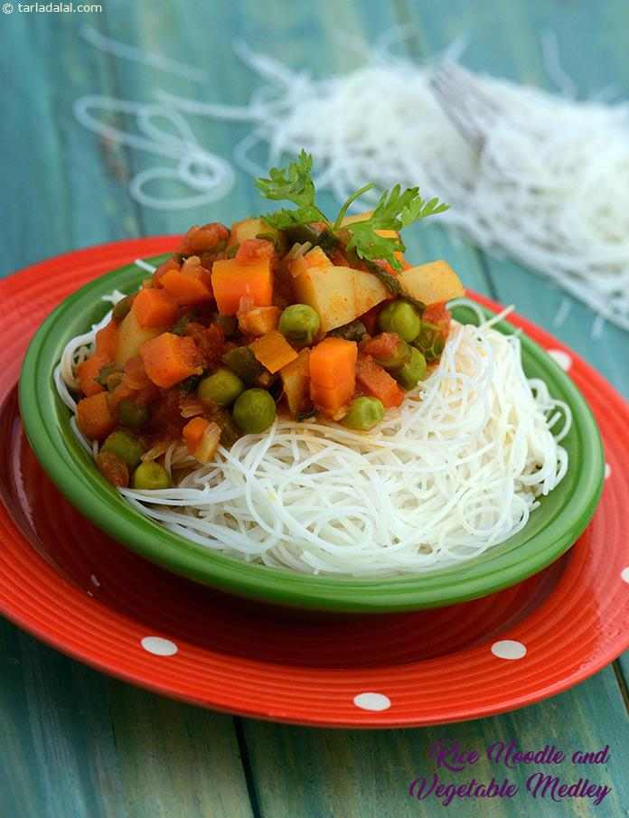 Rice Noodles and Vegetables Medley, vegetables and rice noodles in a sweet and sour tomato sauce.