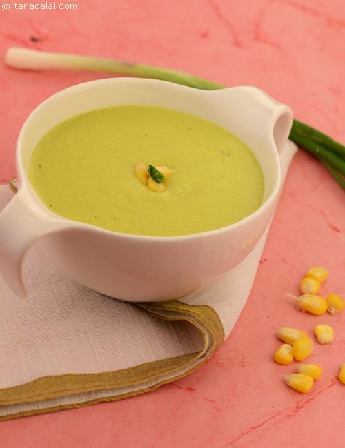 Sopa De Milho Verde (Green Corn Soup), milky corn soup with a dominant flavor of spring onions with greens.