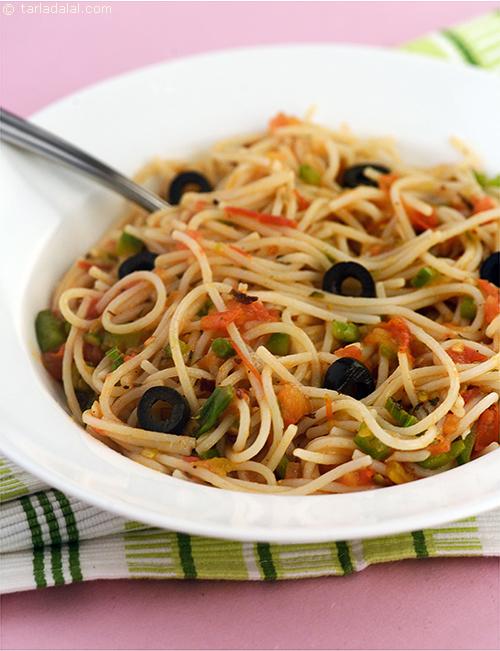Spaghetti Puttanesca, spaghetti tossed with garlic, tomatoes and olives make this a quick and classic combination.