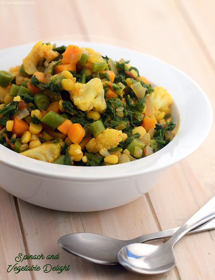 Spinach and Vegetable Delight, this recipe contains an excellent combination of proteins from gram dal. The goodness of iron from spinach and the fibre and vitamins from other vegetables.