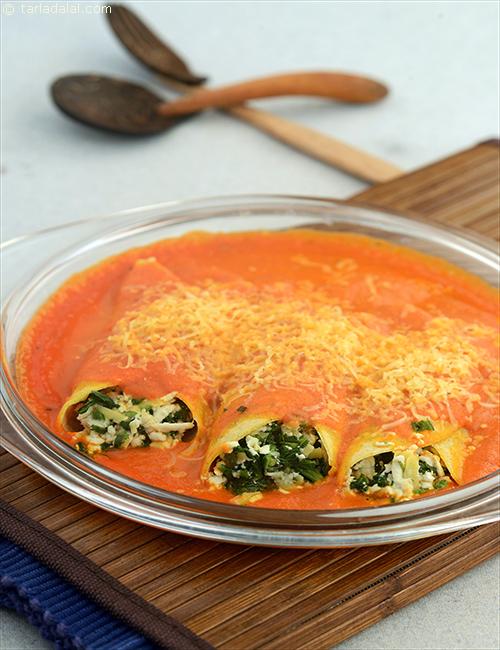 Spinach Stuffed Enchiladas, an all-time favourite from the repertoire of Mexican recipes just made its way into the world of Jain cooking.
