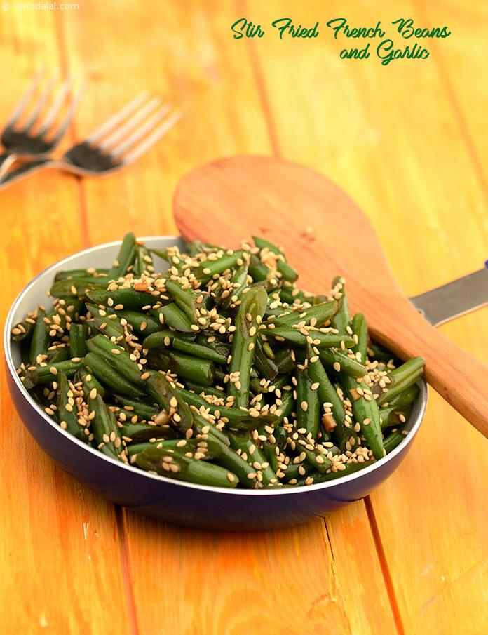 Stir-Fried French Beans and Garlic, as the name suggests is a combination of French beans and garlic, perked up with soy sauce. The stir-fry technique brings out the innate flavour of veggies.