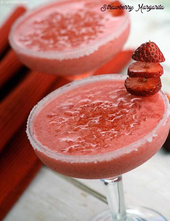 Strawberry margarita, perfect drink to start a party with, but make sure you serve it as soon as you make it or else it will melt. . .